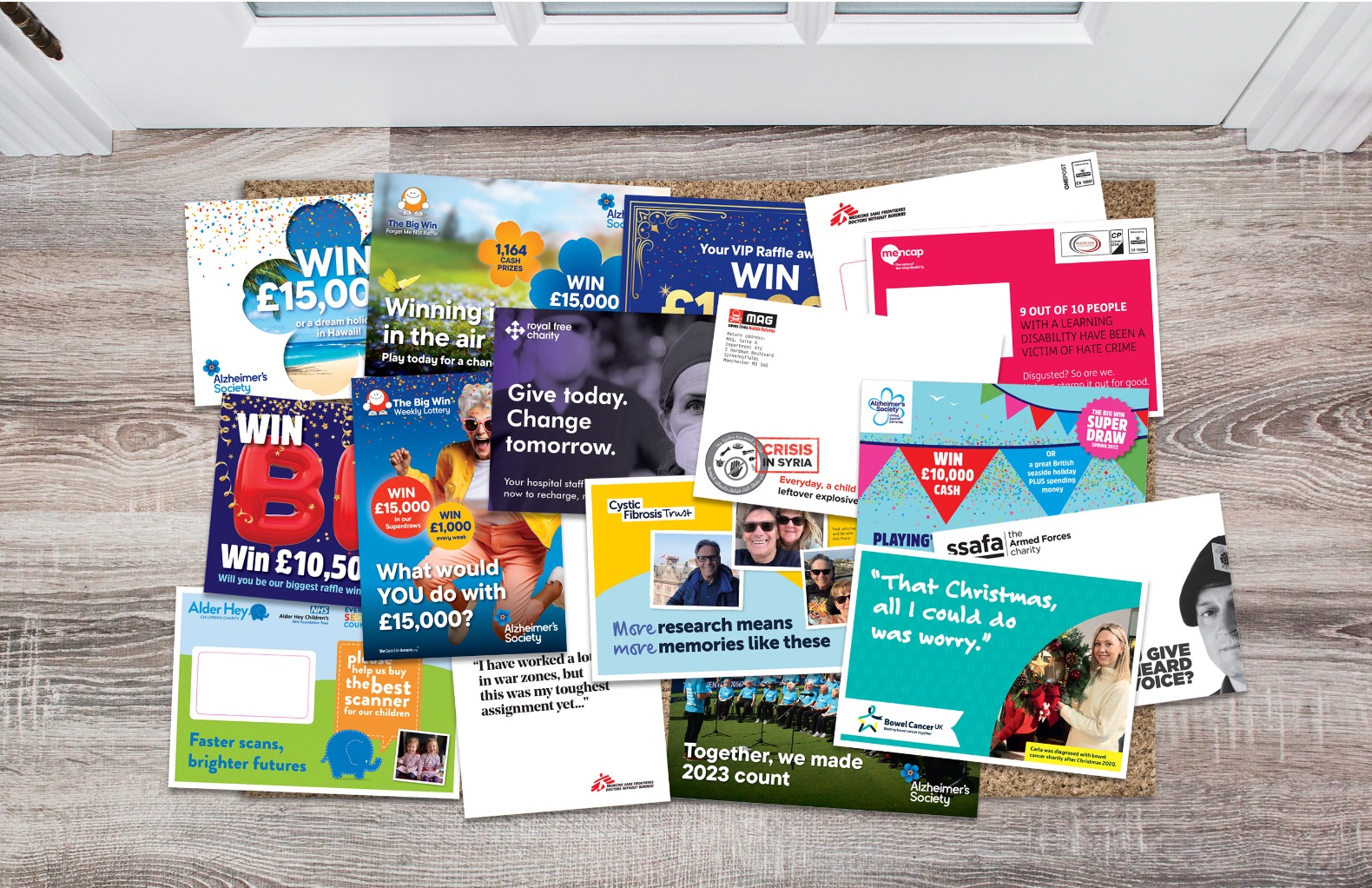 A selection of direct mail pieces for charity clients, spread on a doorstep